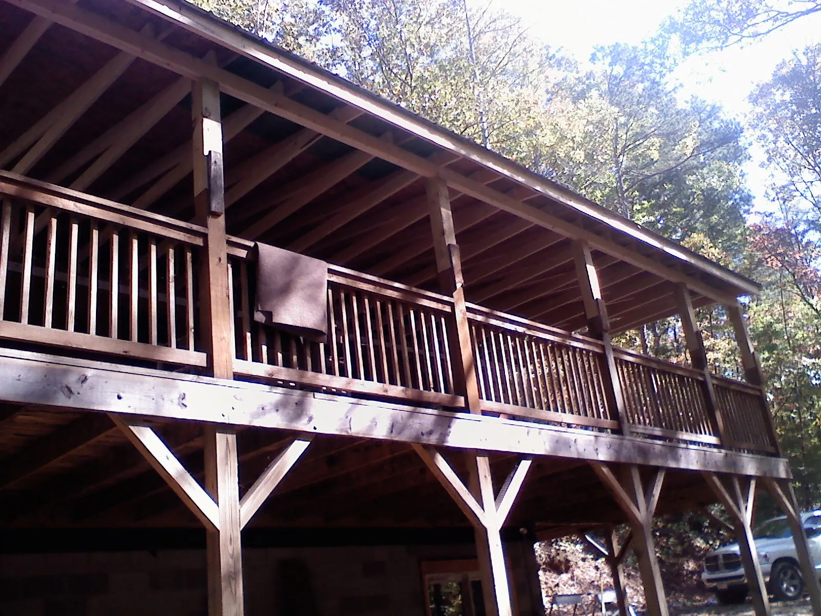 Timber framing under a new elevated porch and deck — Roof Leak Repair in Gales Creek by Roofing Brothers